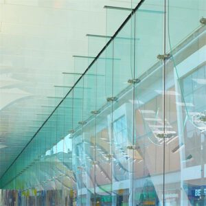 "Modern Dubai facade glass installation with high-quality aluminum framing for commercial and residential buildings"